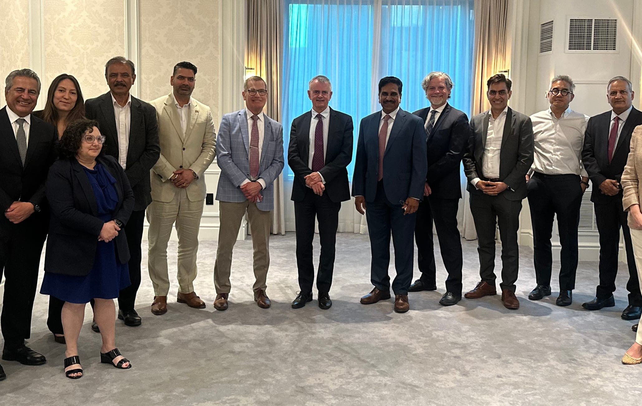 Participants gathered for a group photo after the Executive Roundtable